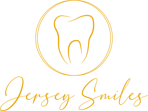 Golden tooth logo encircled, with 'Jersey Smiles' written in cursive below it. Logo is on a transparent background.